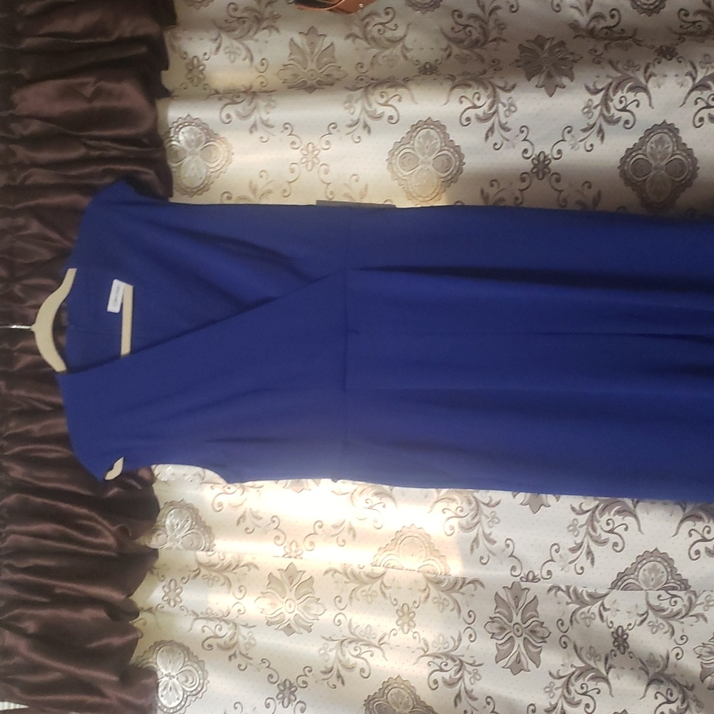 Calvin Klein size 12 jump suit.  New with tags.  No belt